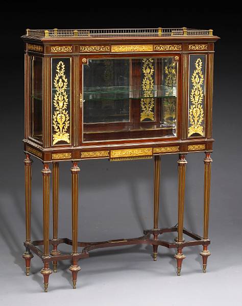 Appraisal: A Louis XVI style gilt bronze mounted mahogany vitrine cabinet