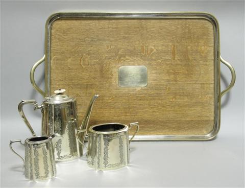 Appraisal: VICTORIAN SILVERPLATED TEA SET AND TRAY The set including a