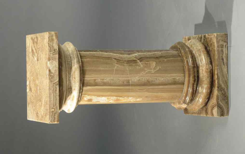 Appraisal: BROWN ONYX MARBLE PEDESTAL all marble construction including square top