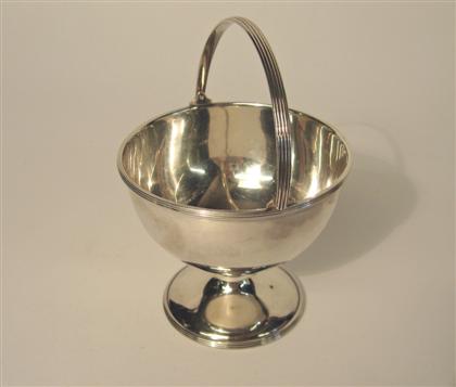 Appraisal: Sterling silver swing handle bonbon dish and silver plate tea