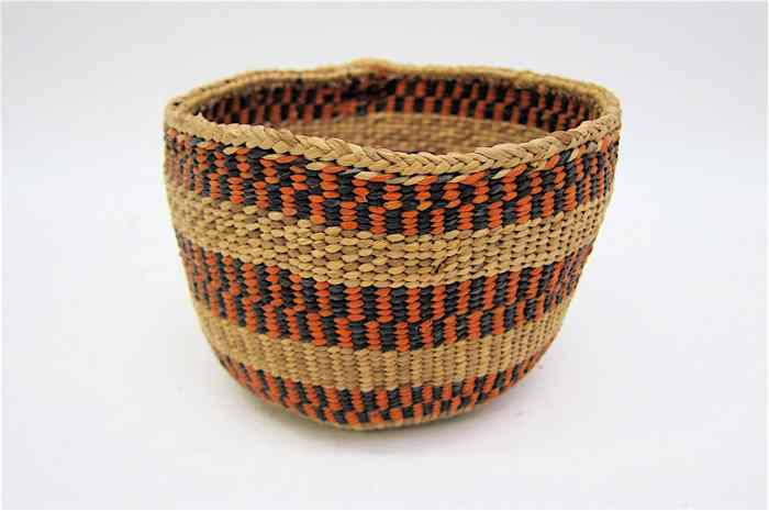 Appraisal: CHEHALIS INDIAN BASKET having three circular layers of black cattail