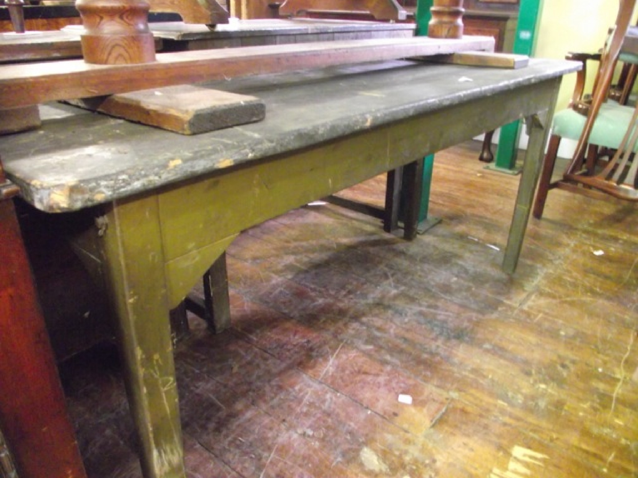 Appraisal: A th century rustic pine cottage dining table raised on