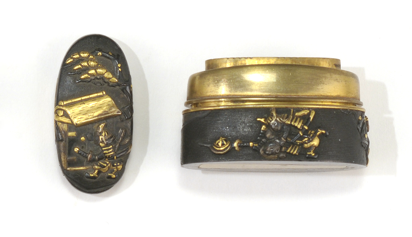 Appraisal: INLAID SHAKUDO FUCHI KASHIRA Depicting samurai warriors Length cm