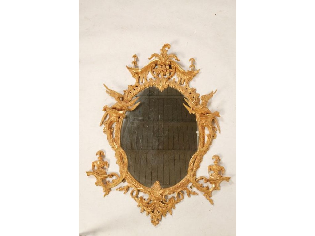 Appraisal: A GEORGE III GILTWOOD MIRROR in the manner of Thomas