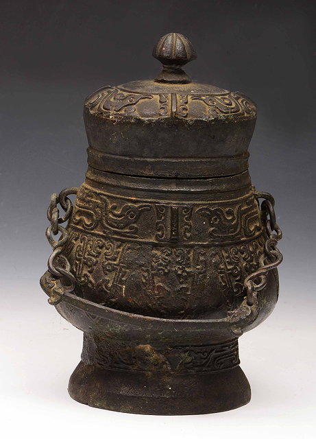 Appraisal: A Chinese bronze archaic style vase and cover th Century