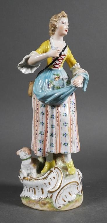 Appraisal: Dresden porcelain figurine of a woman holding a flower with