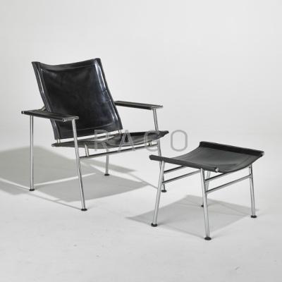 Appraisal: YRJO KUKKAPURO Lounge chair and ottoman Finland s Stitched saddle