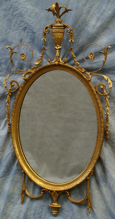 Appraisal: Gilt Federal style oval wall mirror with urn top tall