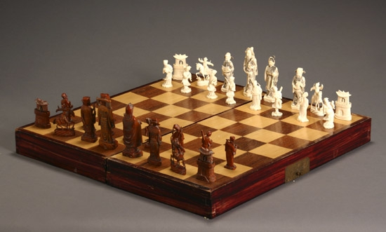 Appraisal: Chinese Engraved Ivory Chess Set With Game Board Case th