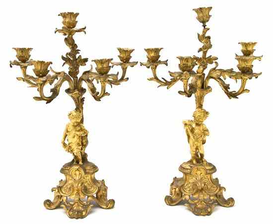 Appraisal: A Pair of Gilt Bronze Figural Five-Light Candelabra cast as