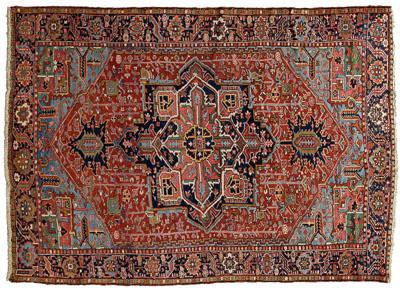 Appraisal: Heriz rug geometric central medallion on brick red ground corner