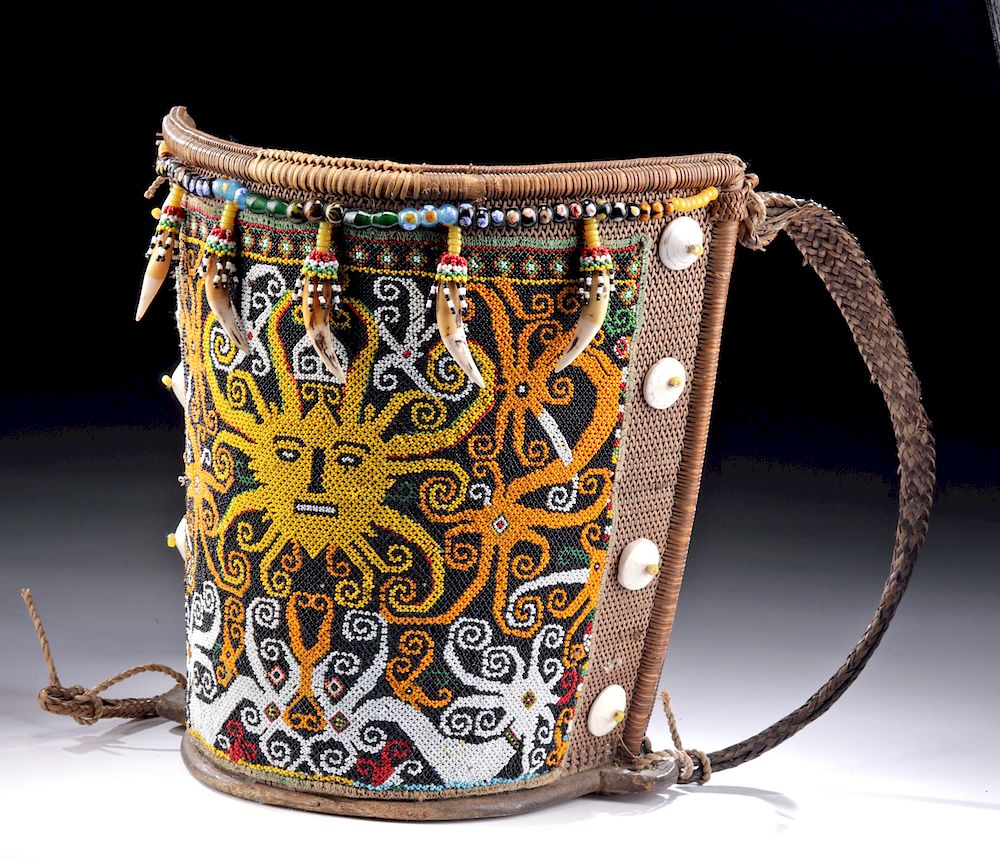 Appraisal: th C Bahau Dayak Woven Baby Carrier with Beadwork Indonesia