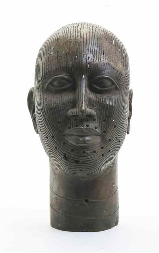 Appraisal: An African Bronze Bust Benin depicting a stylized male figure