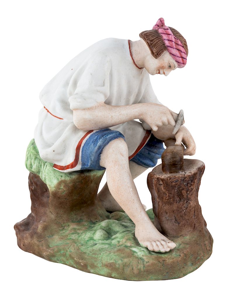 Appraisal: A RUSSIAN PORCELAIN FIGURE OF A BLACKSMITH GARDNER PORCELAIN FACTORY