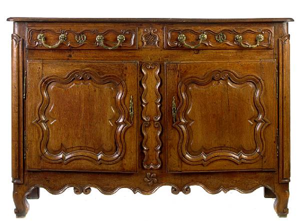 Appraisal: A Louis XV provincial mixed wood side cupboard height in