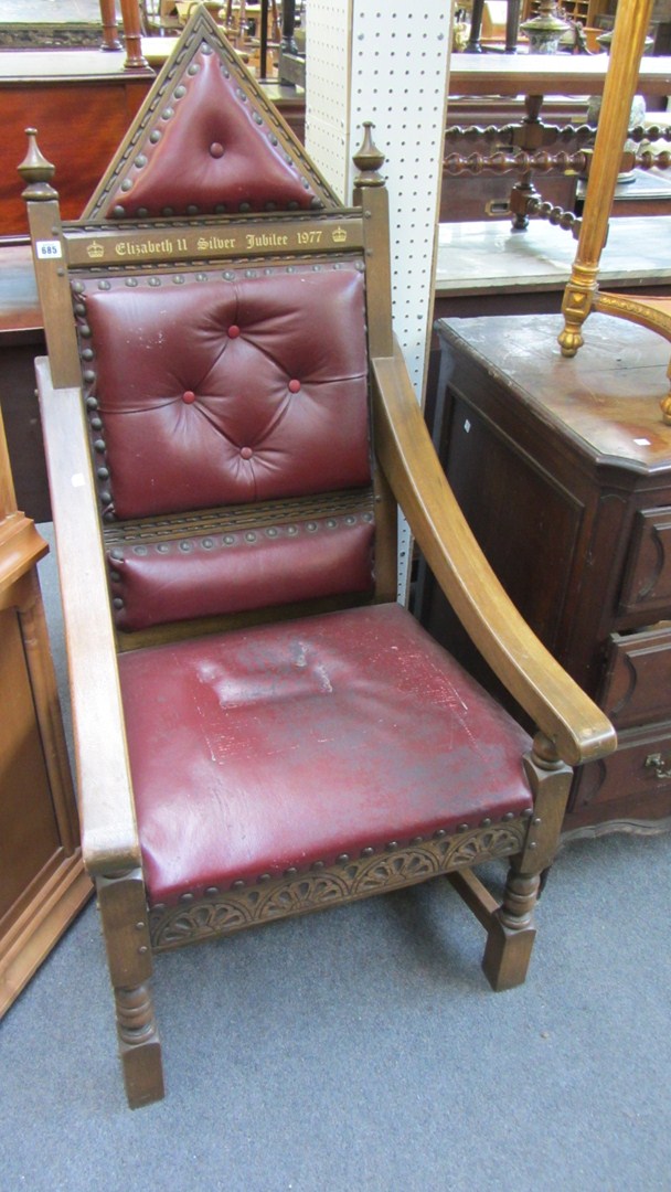 Appraisal: A pair of th century oak throne chairs commemorating Queen