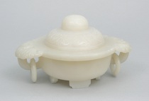 Appraisal: A Chinese Jade Vessel and Cover A Chinese carved jade