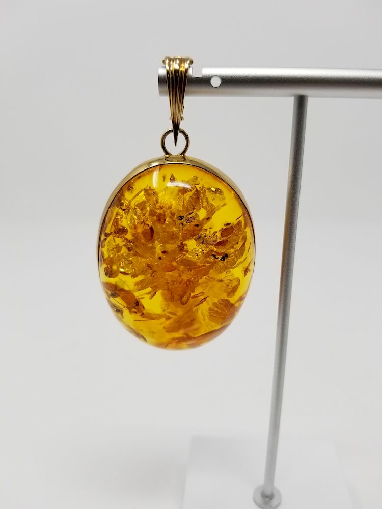 Appraisal: Large K Gold Amber Pendant Large K Gold Amber Pendant