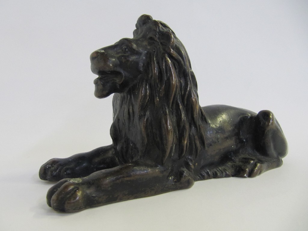 Appraisal: Bronze model of a recumbent lion