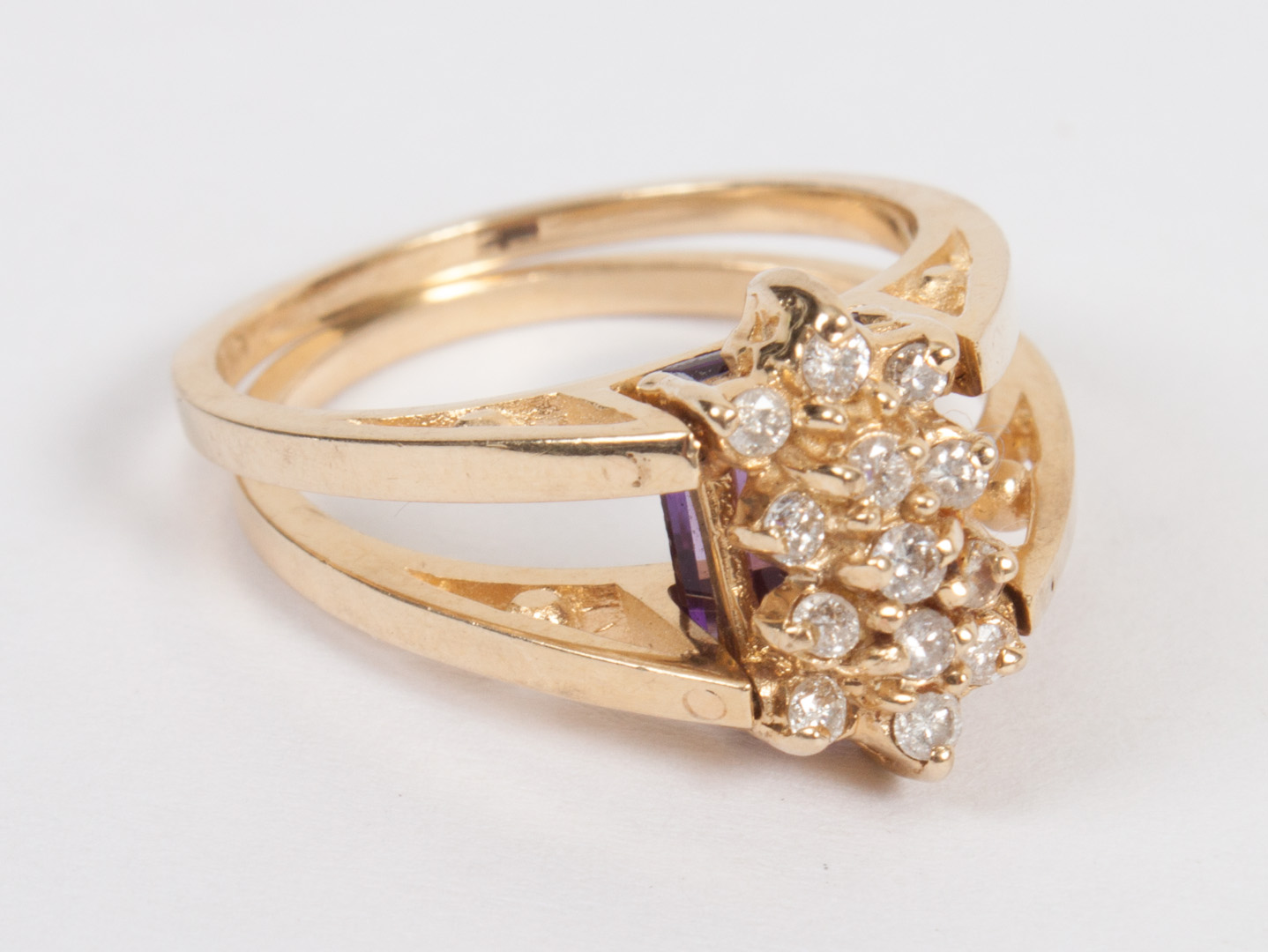 Appraisal: Lady's gold amethyst diamond two-fold ring size grams unmarked gold