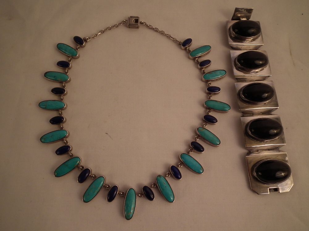 Appraisal: NAVAJO SILVER NECKLACE SIGNED JHERI MEXICAN BRACELET Navajo sterling silver