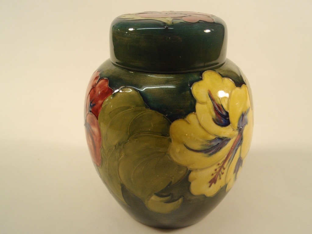 Appraisal: A Moorcroft pottery ginger jar and cover tube lined and