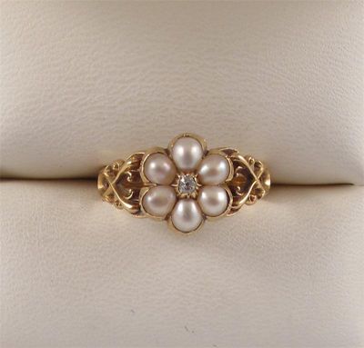 Appraisal: A Victorian pearl and diamond set flower head ring Mounted