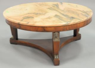 Appraisal: Round mahogany coffee table with pink marble top and metal