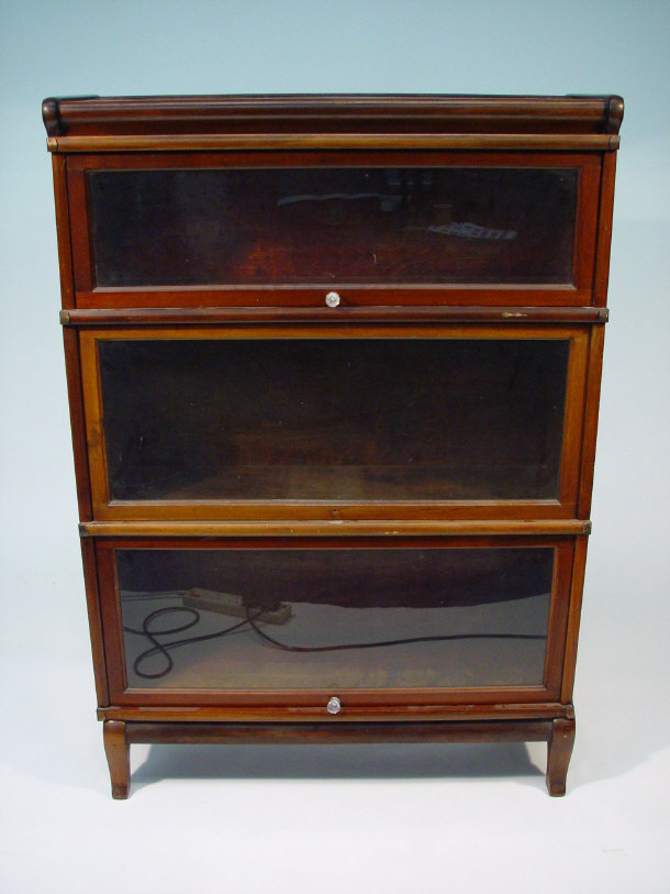 Appraisal: Globe-Wernicke mahogany three section bookcase with glazed doors on a