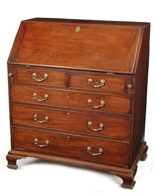 Appraisal: A George III mahogany bureau the leather lined fall enclosing