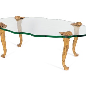 Appraisal: A French Carved Giltwood and Cartouche-form Glass Coffee Table Height