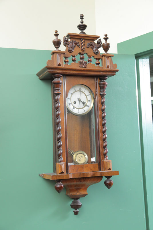 Appraisal: WALL CLOCK Eight day German wall clock with brass works