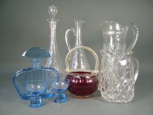 Appraisal: A set of four Georgian style glass liqueur bottles with