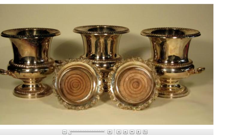 Appraisal: Group of silver plate wine coolers and coastersComprising of three