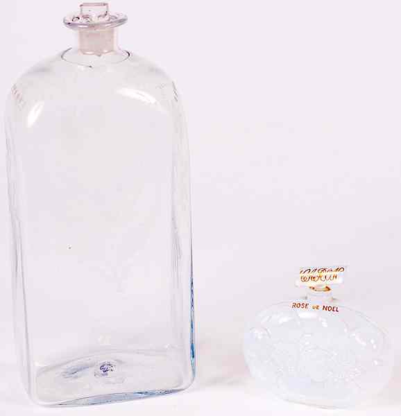 Appraisal: Stiegel Glass Bottle Plus American a Stiegle glass bottle with