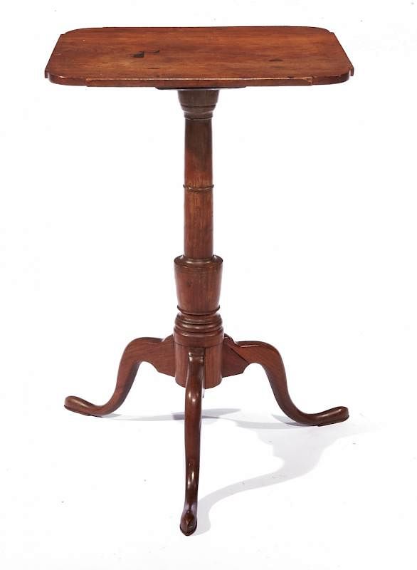 Appraisal: American cherry candlestand table American cherry candlestand table shaped top