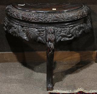 Appraisal: Rococo style demilune console table having carved crysanthemums and birds