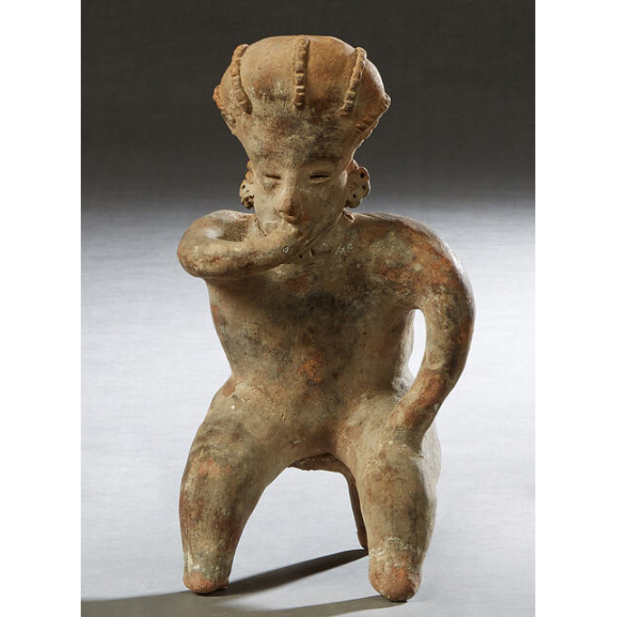 Appraisal: Pre-Columbian Pottery Figure of a seated man with his hand