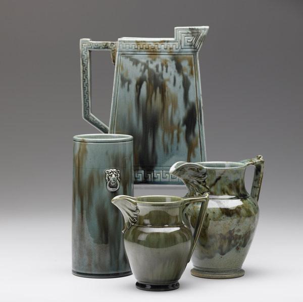 Appraisal: CHELSEA KERAMIC ART WORKS Three pitchers and a vase in