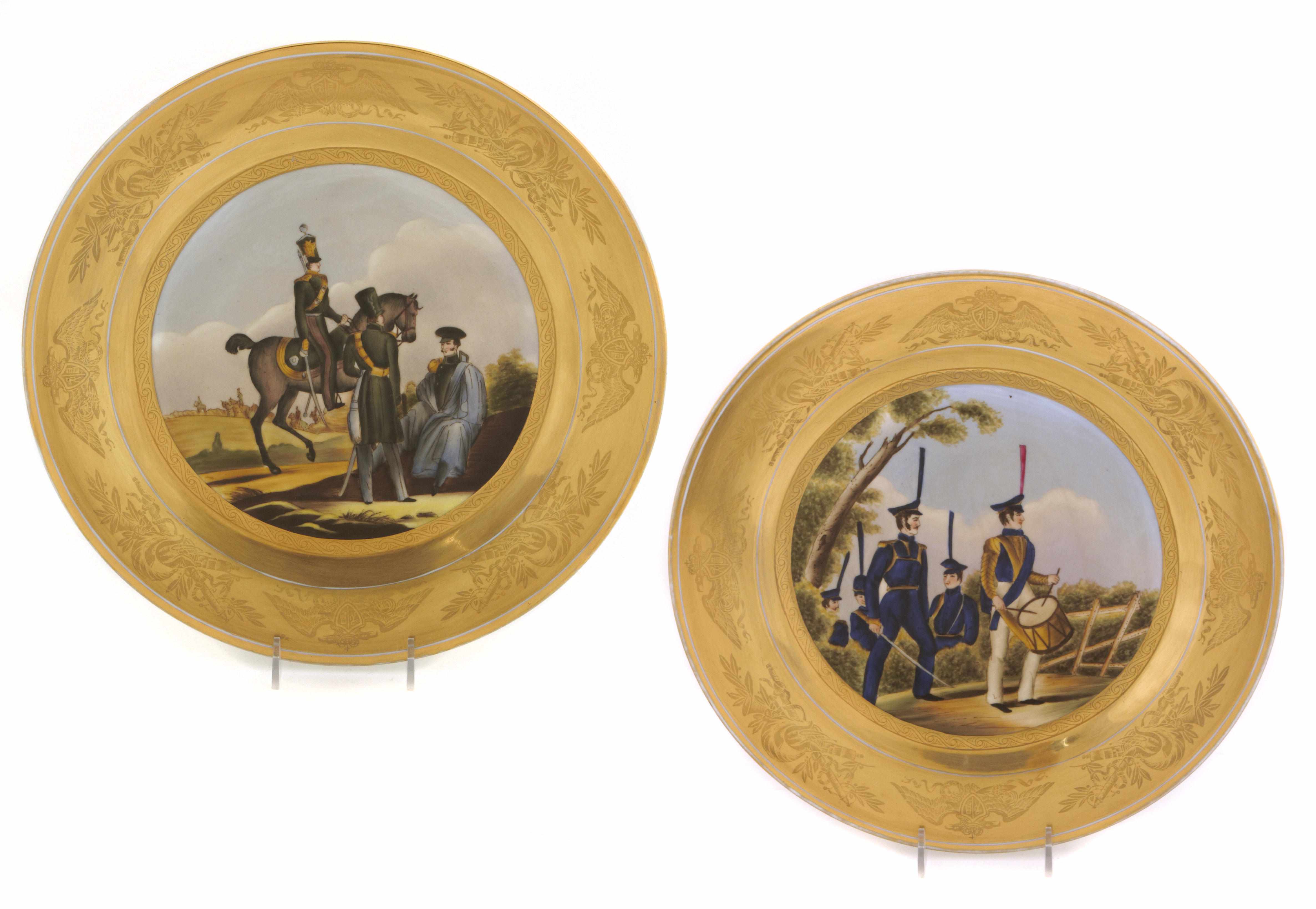 Appraisal: A set of twelve parcel gilt paint decorated plates of