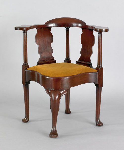 Appraisal: George II mahogany corner chair ca with solid splats and