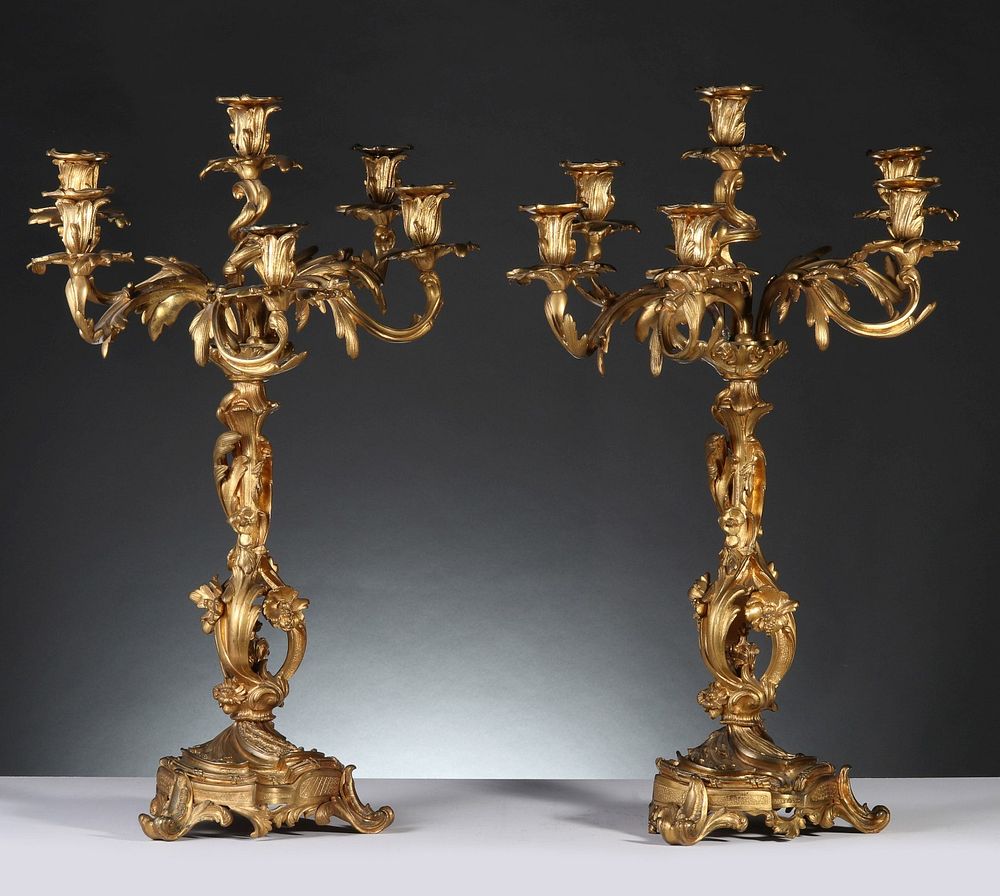 Appraisal: A PAIR LOUIS XV STYLE GILT BRONZE FIVE ARM CANDELABRA