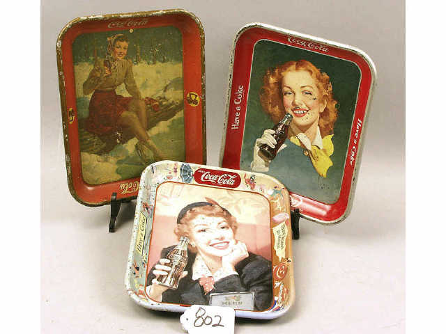 Appraisal: vintage Coca Cola advertising trays by American Artworks Company and