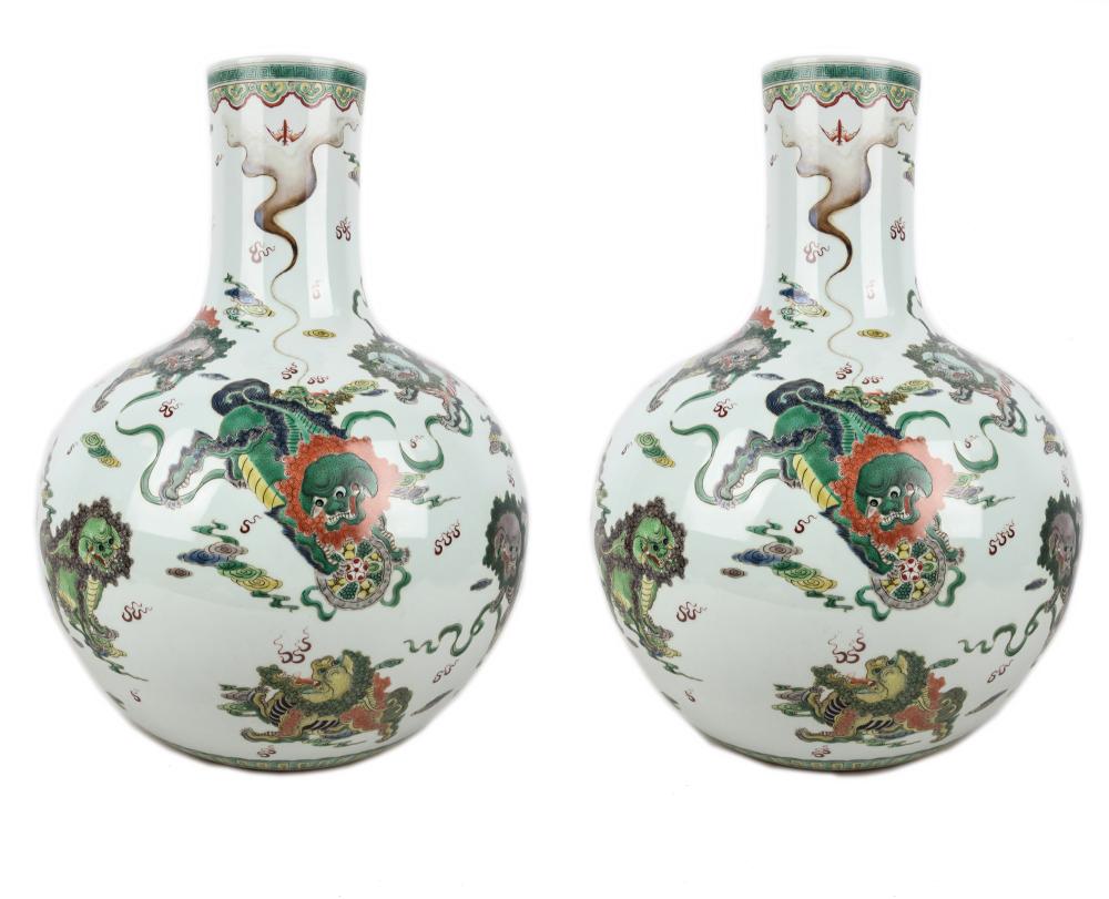 Appraisal: PAIR OF CHINESE FAMILLE PORCELAIN VASESeach with four character mark