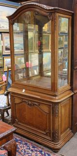 Appraisal: French vitrine French vitrine th century executed in quartersawn oak