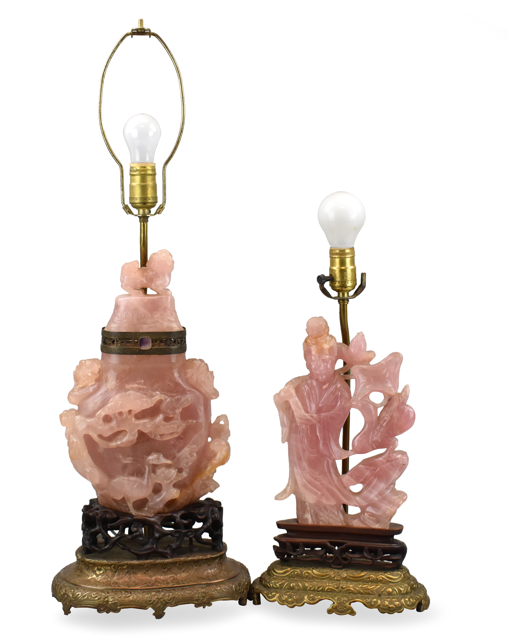 Appraisal: Two large lamps featuring carved rose quartz sculptures on wooden