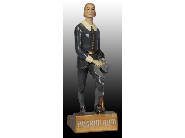 Appraisal: Pilgrim Rum Chalk Ware Advertising Figure Description Few small nicks