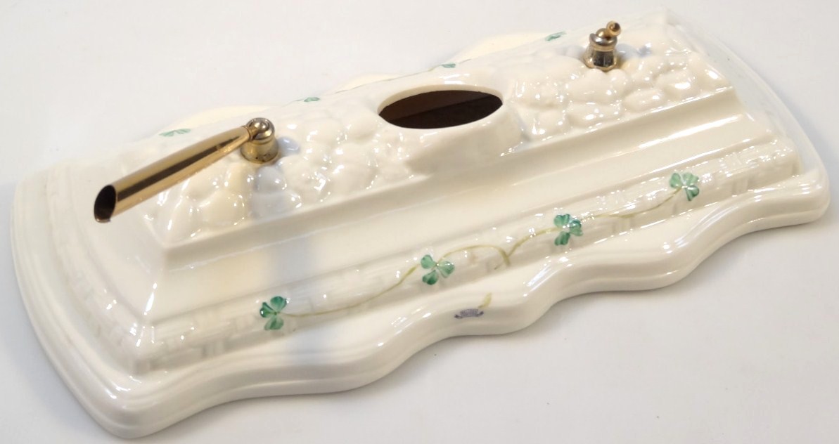 Appraisal: A thC Belleek pen stand with a shaped rectangular outline