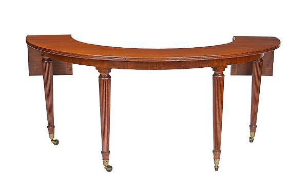 Appraisal: A Regency mahogany wine table The horseshoe shape top with