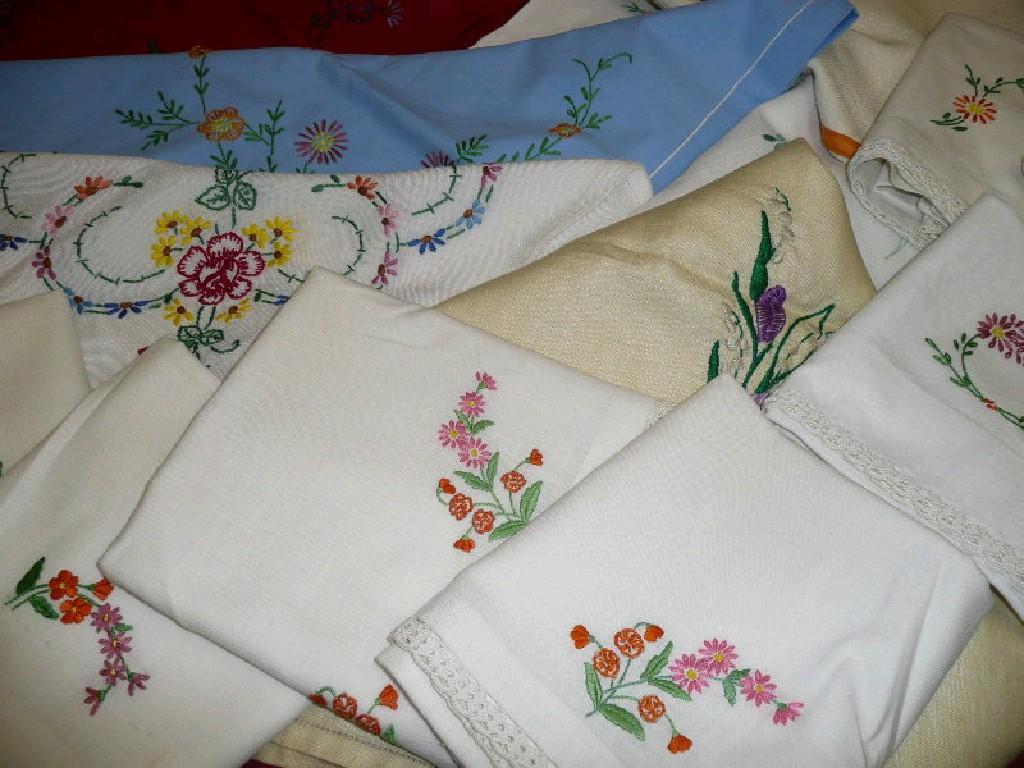 Appraisal: A group of pretty embroidered table cloths - various sizes